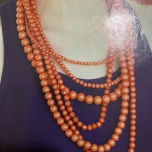 six strands necklace.
